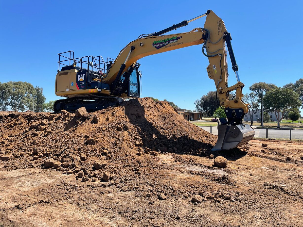 Cat excavator on bulk earthworks